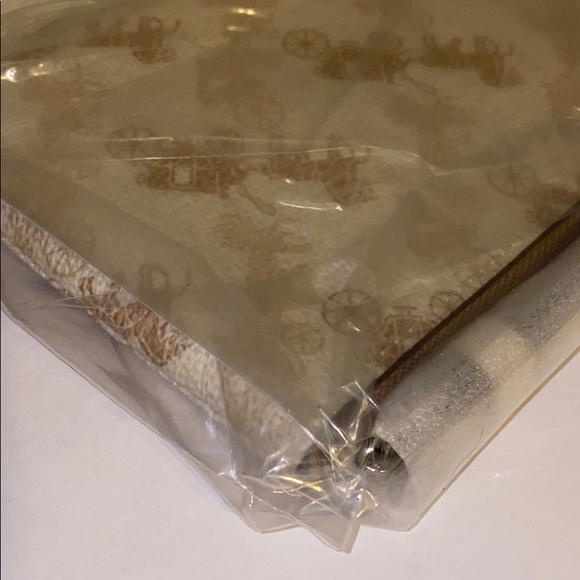 COACH Horse and carriage cream & beige wristlet - Picture 8 of 12